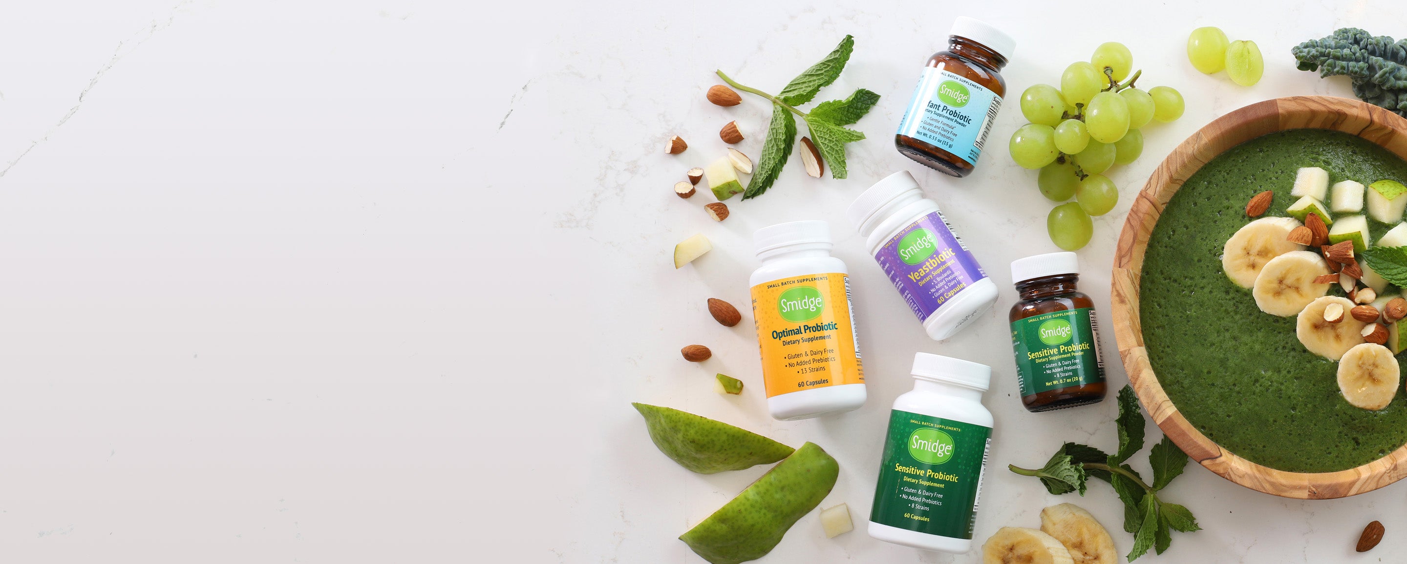 Smidge supplements on a table with a smoothie
